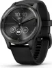 A close-up studio shot of a black Garmin smartwatch. Voir les images du produit