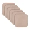 A stack of beige seat cushions arranged diagonally. Anteprima dell’immagine prodotto