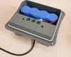 An open grey plastic enclosure containing a blue battery pack and some electronic components. Produktbild-Vorschau