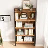 A bookshelf filled with books and decorative items, placed against a white wall. Anteprima dell’immagine prodotto