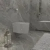 A modern bathroom with a wall-mounted toilet, marble-effect tiles, and a lantern. Produktbild-Vorschau
