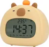 A cute, cartoon-like alarm clock shaped like a capybara. Náhled obrázku produktu