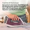 A person is holding a purple and white iron over a light blue garment. Produktbild-Vorschau