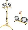 Two views of a yellow and black LED work light with a tripod stand and a portable base. Produktbild-Vorschau