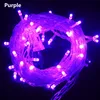 A tangled string of purple LED lights on a black background. Produktbild-Vorschau