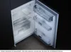 An open refrigerator with shelves and door compartments visible. Produktbild-Vorschau