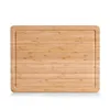 A top-down view of a rectangular bamboo cutting board with a subtle groove around the edge, set against a plain white background. Anteprima dell’immagine prodotto