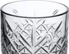 A close-up view of the top portion of a clear glass with intricate geometric patterns. Náhled obrázku produktu
