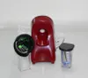 A red vegetable slicer with accessories on a white background. Produktbild-Vorschau