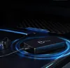 A black electronic device with a logo and vents is placed on a dark surface, with blue light emanating from it in concentric circles. Náhľad obrázku produktu