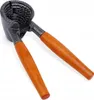 A nutcracker with wooden handles is shown against a white background. Podgląd zdjęcia produktu