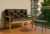 A dark gray cushion on a wooden bench on a balcony. Produktbild-Vorschau