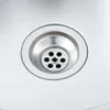 A close-up view of a stainless steel sink drain. Anteprima dell’immagine prodotto