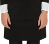 Close-up of a person's torso wearing a black dress with white cuffs. Náhled obrázku produktu