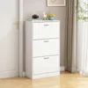 A white shoe cabinet with three drawers is shown in a room next to a white door and a window with curtains. Náhľad obrázku produktu