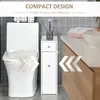 A bathroom scene showing a toilet and a narrow storage unit next to it. Voir les images du produit