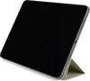 A tablet case is shown standing upright on a white background. Voir les images du produit