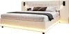 A modern upholstered bed with integrated lighting and bedside tables. Anteprima dell’immagine prodotto