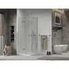 A modern bathroom with a shower cabin, bidet, and towel rack. Podgląd zdjęcia produktu