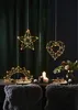 A table setting with decorative lights and candles. Produktbild-Vorschau
