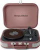 A vintage-style record player is shown with its lid open. Náhled obrázku produktu