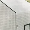 A close-up view of a white greenhouse cover with a grid pattern and dark green trim. Voir les images du produit