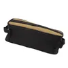A black and tan storage bag for camping equipment. Podgląd zdjęcia produktu