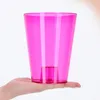 A hand holding a pink orchid pot against a white background. Anteprima dell’immagine prodotto