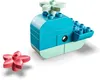 A toy whale and a flower made of building blocks on a white background. Náhled obrázku produktu
