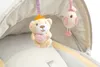Close-up of hanging toys on a baby swing or bouncer. Anteprima dell’immagine prodotto