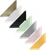 A collection of shelf brackets in various colors arranged diagonally. Produktbild-Vorschau