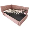 A pink upholstered bed frame with the slatted base lifted to reveal storage underneath. Produktbild-Vorschau