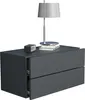 A dark gray nightstand with two drawers, a lamp, and a small digital clock on top, set against a white background. Produktbild-Vorschau