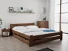 A bedroom scene with a wooden bed as the main focus. Náhled obrázku produktu