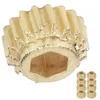 A close-up of a single brass gear with a hexagonal hole in the center, and a small stack of similar gears in the bottom right corner. Podgląd zdjęcia produktu