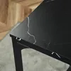 Close-up of a black marble-patterned tabletop with a black metal frame. Náhled obrázku produktu