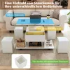 A living room scene featuring a white couch, a white coffee table with storage, and four white ottomans. Anteprima dell’immagine prodotto