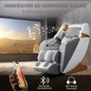 A massage chair is shown in a room with a large screen displaying a landscape, suggesting an immersive entertainment experience. Produktbild-Vorschau