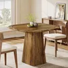 A dining table set in a dining room with chairs and a sideboard in the background. Náhľad obrázku produktu