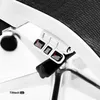 A close-up view of the control levers and indicators on an office chair. Voir les images du produit