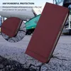 A red flip phone case is shown in a dynamic, angled shot on a cracked asphalt surface, with a blurred industrial background. Produktbild-Vorschau