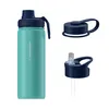 A turquoise thermos bottle with two different navy blue caps shown separately. Podgląd zdjęcia produktu