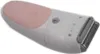 A close-up, angled view of a white and pink electric epilator against a white background. Voir les images du produit