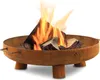 A rusty metal fire pit with burning logs inside, set against a white background. Náhled obrázku produktu