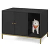 A black cat litter box enclosure with gold legs and a cat inside. Produktbild-Vorschau