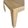 A close-up view of a wooden table leg and corner. Náhled obrázku produktu