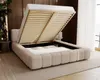 A beige boucle upholstered bed with its storage compartment open, revealing the slatted base and mattress. Náhled obrázku produktu