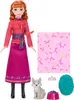 A doll and accessories are displayed against a white background. Produktbild-Vorschau