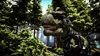 A cybernetically enhanced Tyrannosaurus Rex stands in a forest clearing, partially obscured by lush green foliage. Náhled obrázku produktu