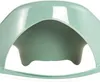 A close-up, studio shot of a green child's toilet seat. Voir les images du produit